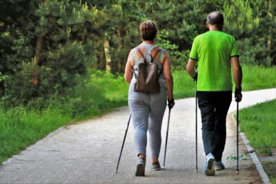 Senior Couple Walking with Sticks